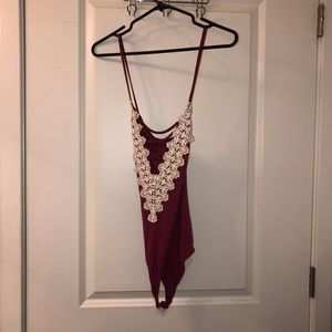 garnet/maroon colored  bodysuit